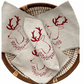 Set of 4 Christmas Deer and Garland Linen Napkins in red with eco-friendly screen print on natural linen
