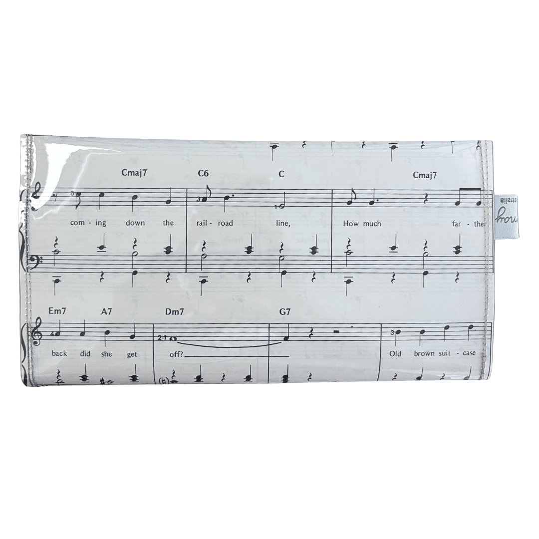 backview of handmade wallet with sheet music design on a white background