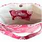 Close-up of inside of LyssyMay handprinted pink and white patterned bag with inside pocket