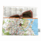 Recycled street map wallet featuring Brisbane suburbs design made from original UBD map pages with clear PVC protection and magnetic closure